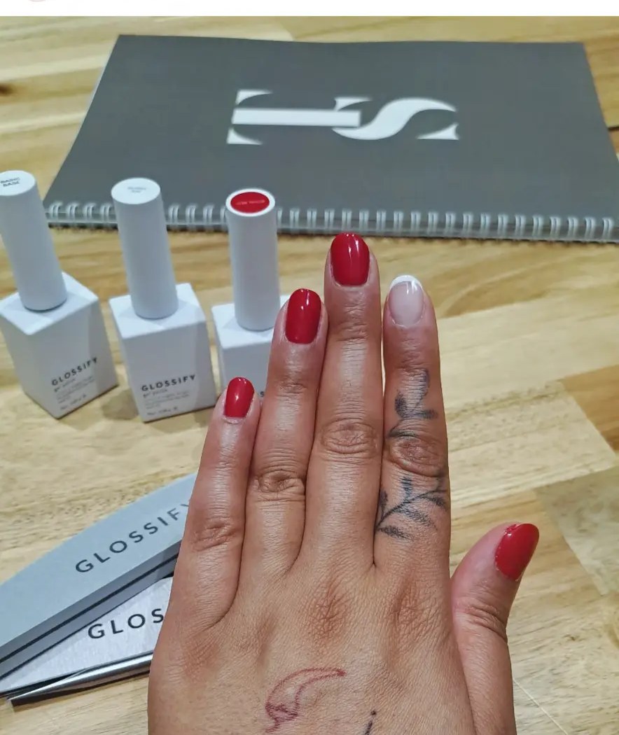 Bal's very first set of nails, painted red on her first training day