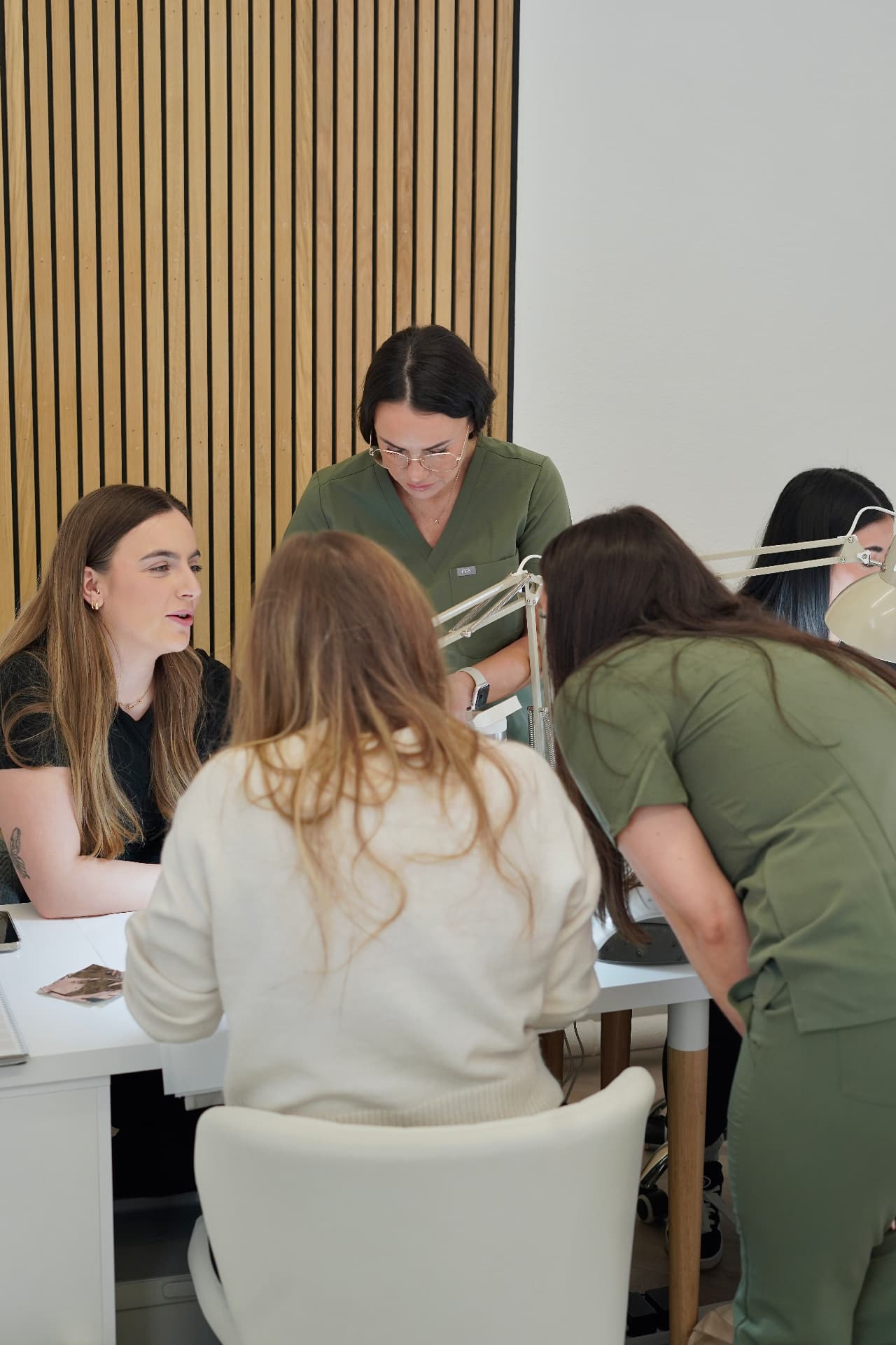 A small training group working together at the studio